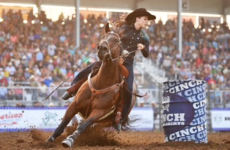 Ember Schira competes in barrel racing at Nationals