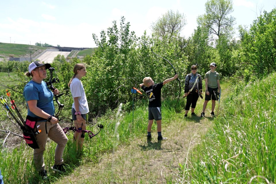 Dana and Naveah Duke,  Tylan Lavoie, Stacey Gedak and Ryker Wall teamed up for 3D Archery event.                             