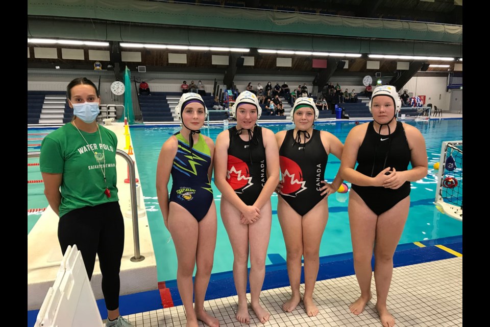 From left, coach Taylor Molde, Jennika Linthicum, Rachel Tober, Mahlyn Bomberak and Ryan Hoeving were part of the U15 girls Sharks team.