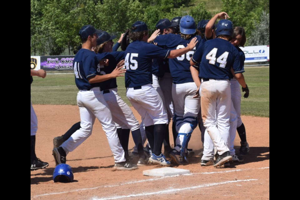 The Estevan U15 AA Brewers celebrate after advancing to the championship game.