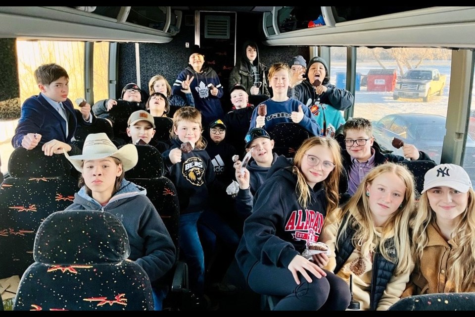 The entire Kamsack Flyers team crammed together in a bus to head to Balgonie for their second game in the provincials.