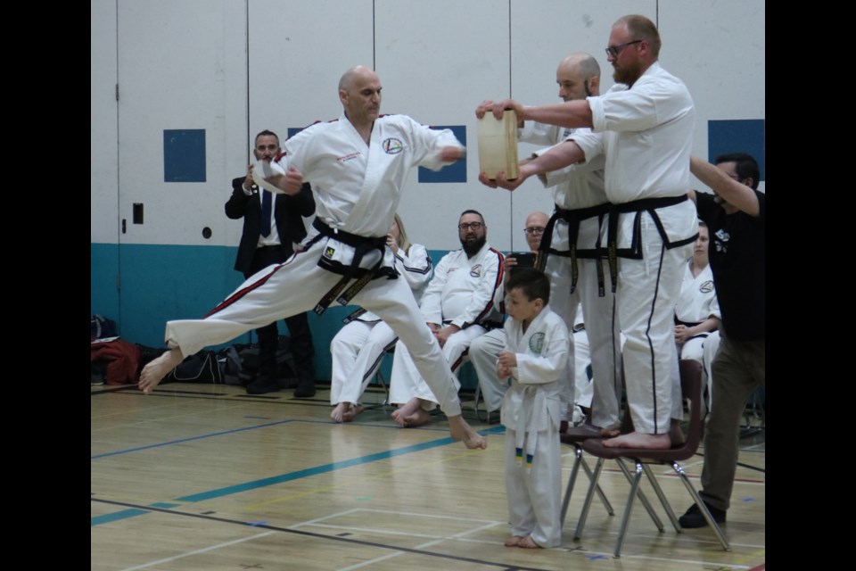 A fist stroke at boards.