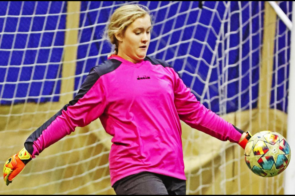Goaltender Gabriella Friesen prepared to kick the ball to her teammates, during a recent practice.