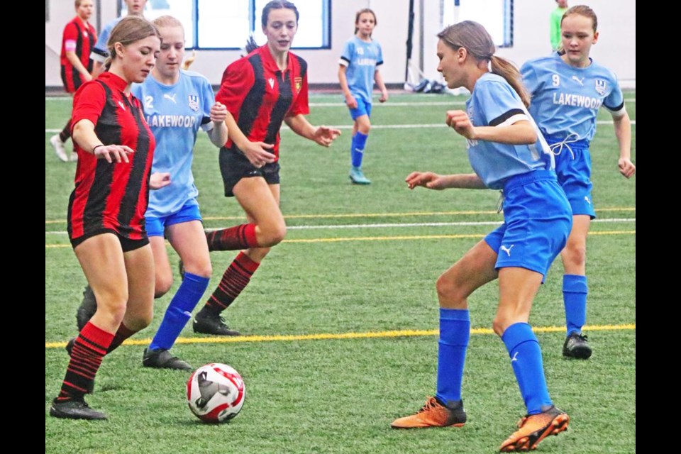 Weyburn U13 player Mya G. looked to pass the ball to a teammate, during a game vs Saskatoon Lakewood on Saturday.