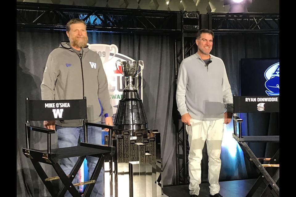 Blue Bombers Coach Mike O’Shea and Argonauts Coach Ryan Dinwiddie with the Grey Cup.