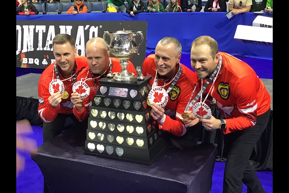 Brad Gushue and Team Canada celebrate after winning the 2024 Brier in Regina.