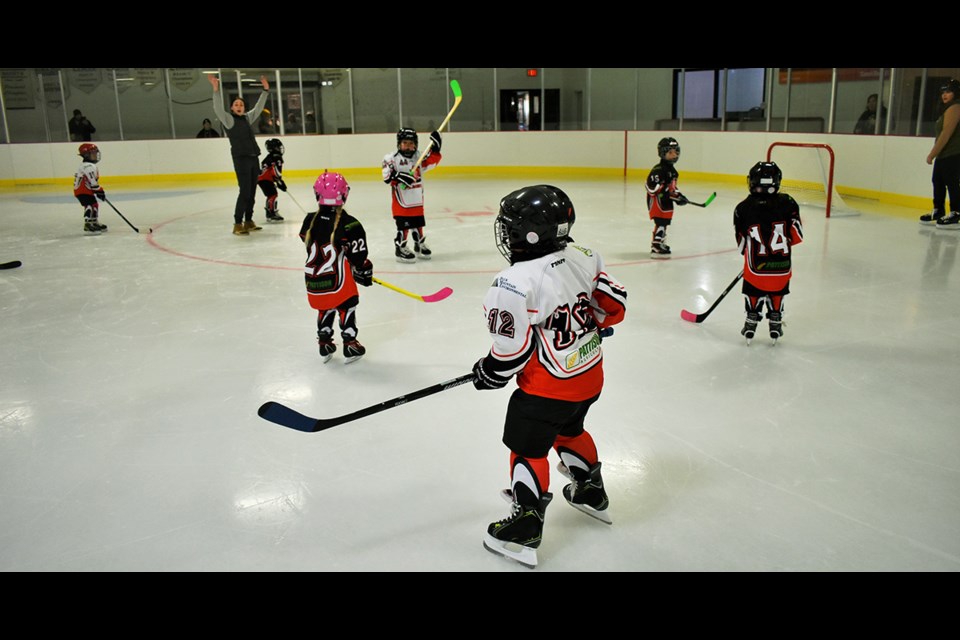 Members of the Kamsack Under 7 (U7) Team 1 and Team 2 who played one another during Minor Hockey Day in Kamsack on Jan. 7, were: Dot Foster, No. 22, Jaden Shingoose, 44; Asher Guillet, 12 and Katleya Whitehawk, 14. 