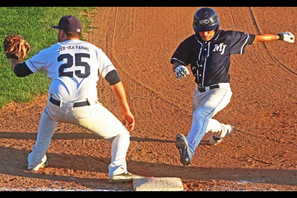 Weyburn Iron Pigs first baseman Kelton Hoium had his glove out for the throw from the pitcher, as a Moose Jaw runner stepped back on the bag, during the Iron Pigs opening game of the QVBL playoffs on Tuesday night.