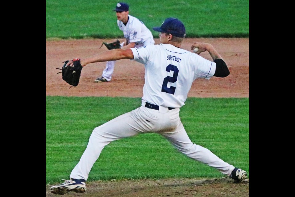 Pitcher Luke Niemegeers fires in a strike in the second game of the QVBL league finals on Thursday evening at Tom Laing Park.