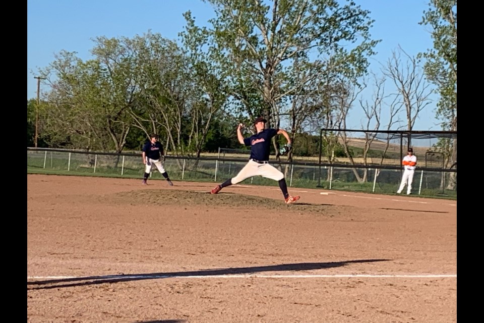 Unity Jr. Cardinals pitcher Garin Scherr on the mound at home as the team hosted the North Battleford Beavers June 2.