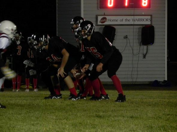 Unity's junior Warrior football team played Macklin at the Sept. 23 night lights game.