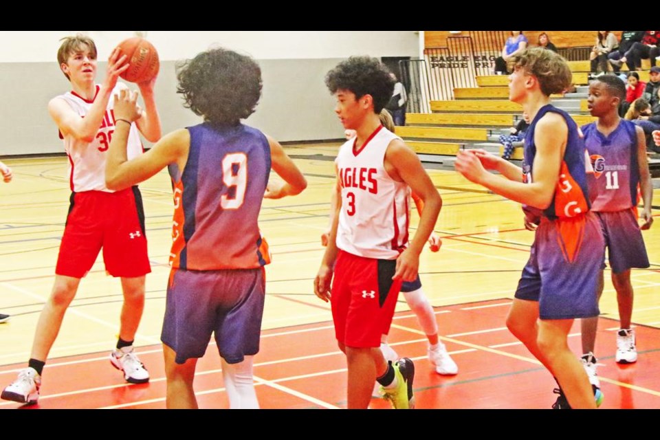 WCS Eagles player Wyatt Kot looked for an open teammate to pass the ball to, during Friday's game vs Swift Current.