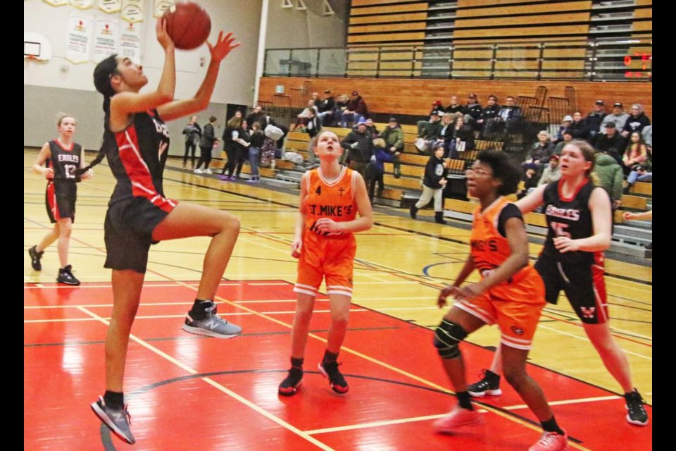 WCS Eagles player Assiya Benabdallah goes up for two points in the game vs St. Michael on Friday evening.