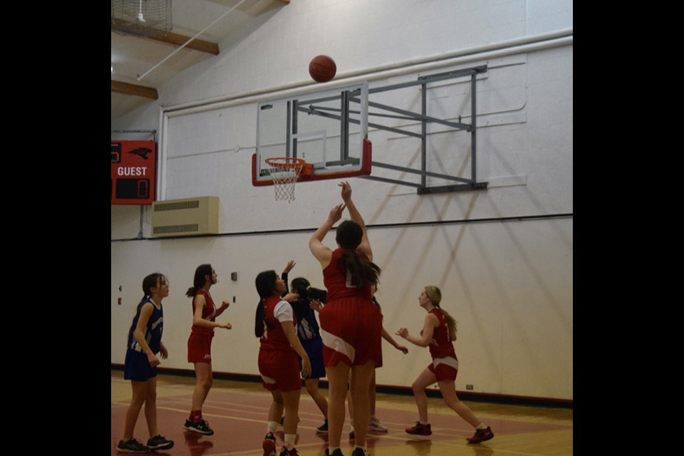 This jumper was one of many shots made by Maddy Dutchak for the CCS junior girls basketball team (red uniforms) in a victory over the visiting Kamsack Spartans on Feb. 1.