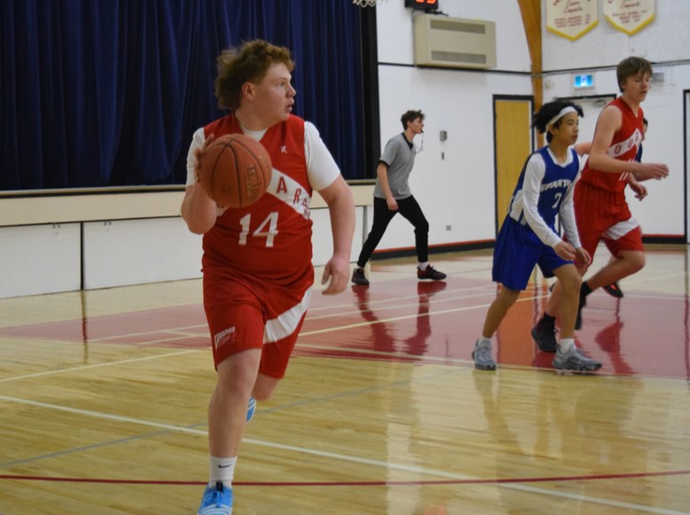 Jordan Makowsky brought the ball up the court and looked for a teammate to pass to as the Canora Composite School Cougars junior boys basketball team defeated Kamsack on Feb. 2 in Canora.