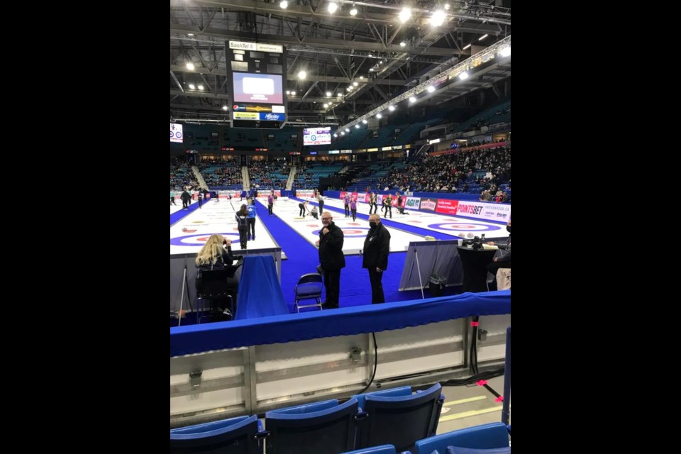 Wilkie's Kevin Glessing, standing with fellow official, Dennis Schoeler,  is part of the officiating crew at the Canadian Olympic Curling Trials taking place in Saskatoon Nov. 20-28
