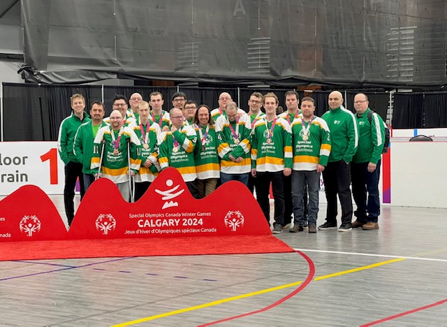 Team Saskatchewan, that includes Assiniboia resident, Kyle Giraudier, sporting their newly earned bronze medals won at Canada Winter Games in Calgary Feb. 27-March 2.