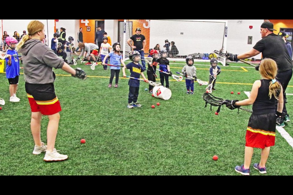 A group of young children tried out some of the basics of lacrosse, at a try-out evening for the sport, held by the Weyburn Lacrosse Association.