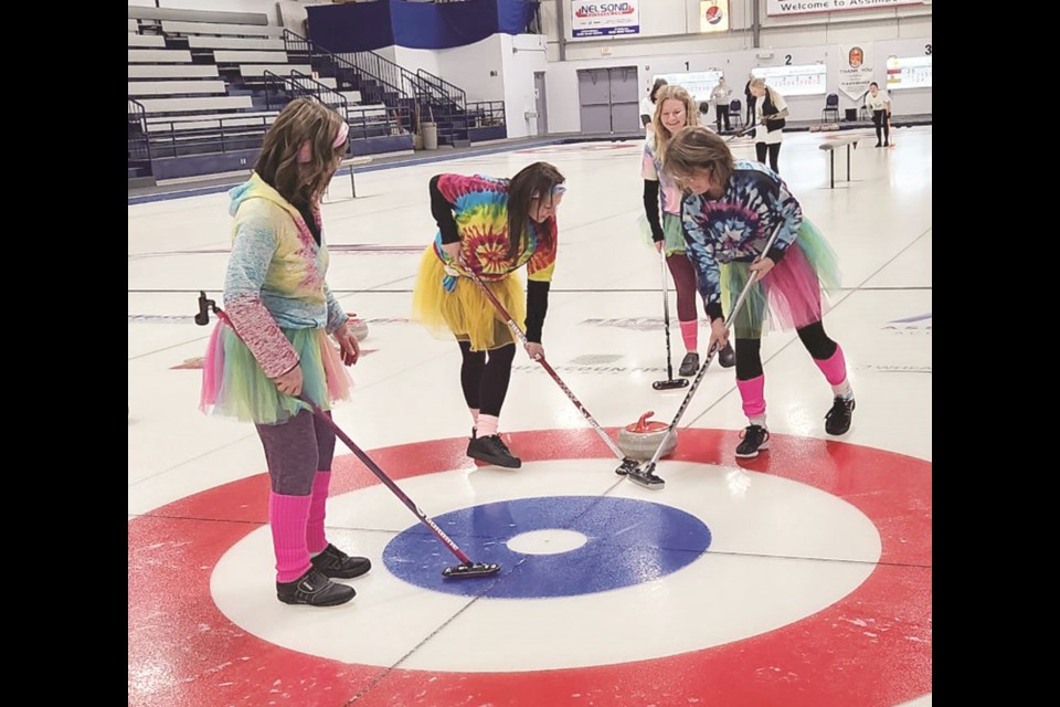 Curlers Kelly Elder, Emily Jepson, Amanda Setrun and Denise Skinner compete in the Ladies ‘Funspiel’ bonspiel.