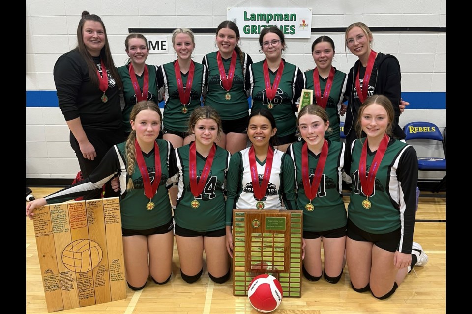 The Lampman School Grizzlies celebrate after winning the 1A girls' provincial title. 