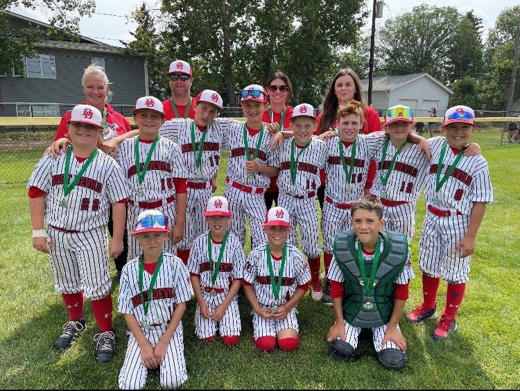 It was all smiles for the 11U Luseland Dust Devils as they captured a provincial silver medal July 16.
