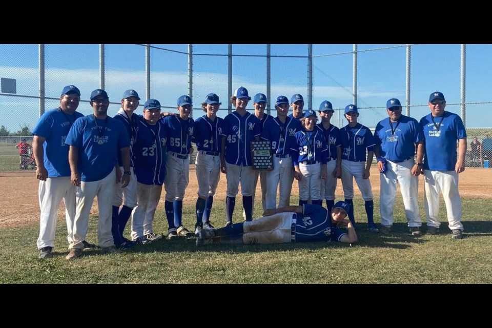 Assisstant coach Wade Stang, coach Jason Russell, Caden Gartner, Kasen Folk, Jackson Russell, Ethan Veller, Blake Stang, Chase Weinkauf, Issac Fleck, Hudson Krieger, Rhett Partington, Myles Stang, Kaegan Lowe, Asst Coach Craig Folk, assisstant coach Curtis Gartner and Pherson Loehndorf in front, after capturing provincial gold medal.