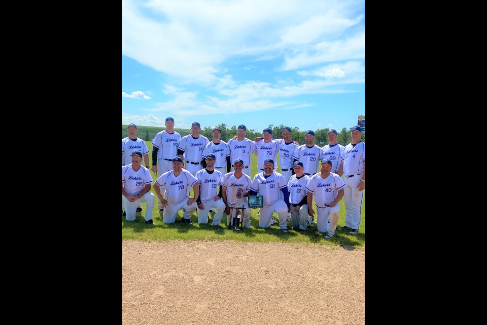 Back L-R: Don Crich, Troy Winterhalt, Kurtis Kryzanowski, Bert Gartner, Curtis Loehndorf, Don Gette, Jesse Duchsherer, Chris Crich, Curtis Scherger, Bye Braun. Front L-R: Peter Sieben, Joey Scherger, Derrick Lantz, Dustin Gartner, Mike Volk, Kim Gartner, Curtis Gette. 2022 Twilite baseball provincial champions.