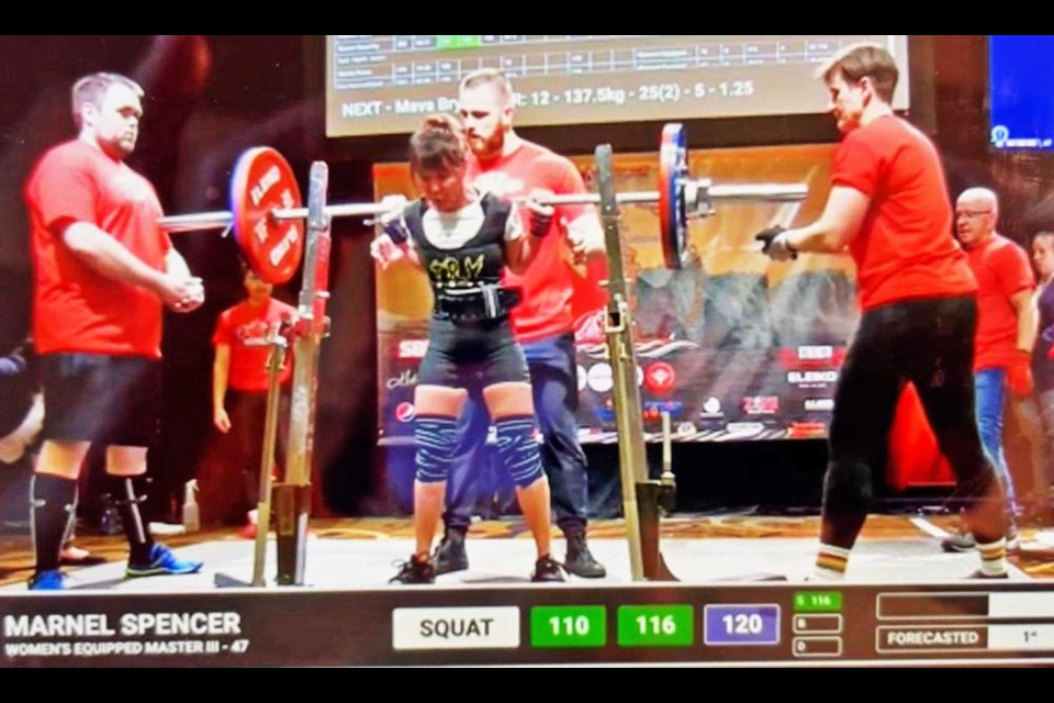 Weyburn powerlifter Marnel Spencer is shown making one of her attempts at the national finals in St. John's, Nfld., and she went on to set national records, with an invite to attend Worlds in October