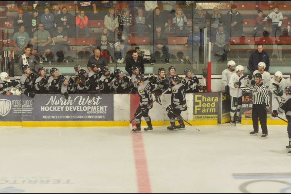 The bench celebrates captain Ryland McNinch's goal in SJHL action. McNinch was named the SJHL’s Most Sportsmanlike Player in 2022.