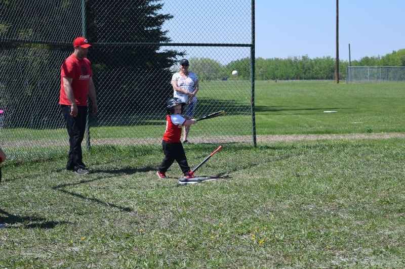 In a game between a pair of U6 Canora teams, this swing by Remi Desrochers of Team 1 made solid contact with both the ball and the tee. 