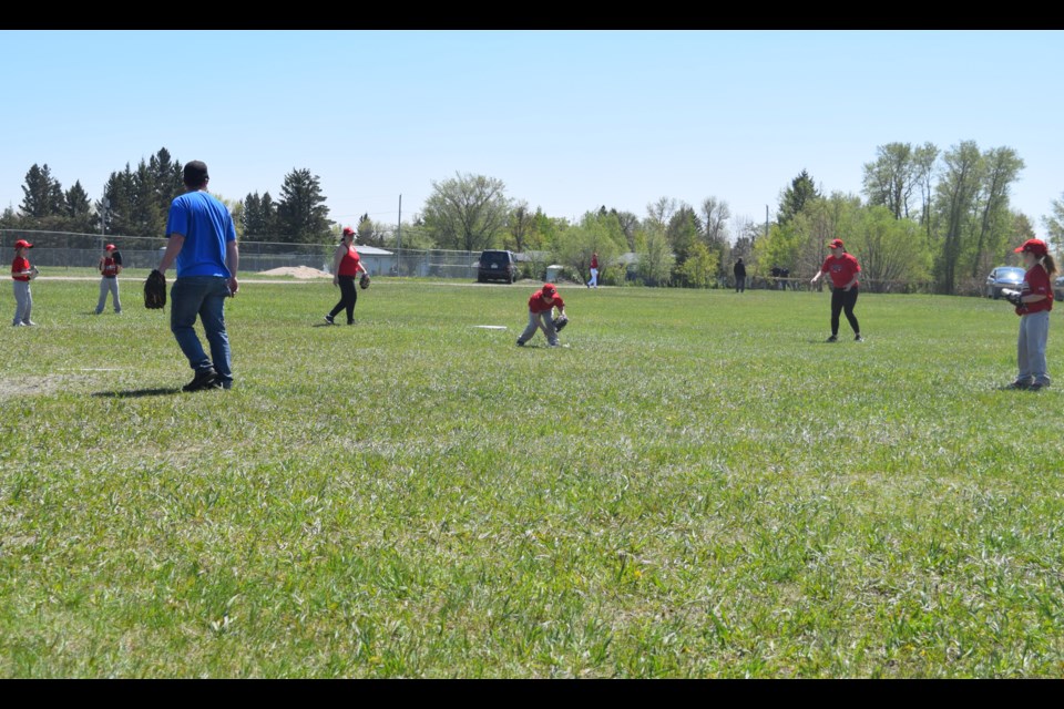 Under sunny skies on June 4, these U8 Canora Team 1 players and their coaches enjoyed being in the thick of the action on Canora Minor Ball Day. All 12 Canora teams in minor baseball and girls softball took to the field versus visiting teams from Cote First Nation, Keeseekoose First Nation, Yorkton, Norquay, Hudson Bay, Kamsack and Preeceville. See the full story and more photos in next week’s Canora Courier.