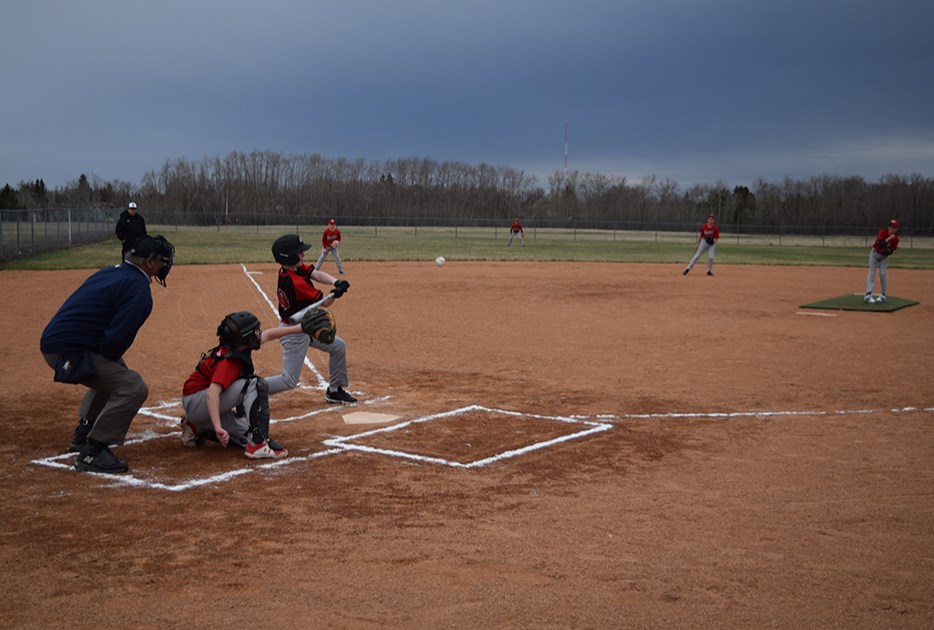 It was cloudy, cool, and a bit drizzly in Canora on May 8, but there was plenty of enthusiasm in the air as Canora Reds 13U pitcher Cameron Sznerch was throwing strikes to catcher Lucas Thompson at the start of the new baseball season. The Reds faced the visiting Yorkton Team 1 in the first game of the season, but unfortunately came out on the short end of a 7-1 final score.