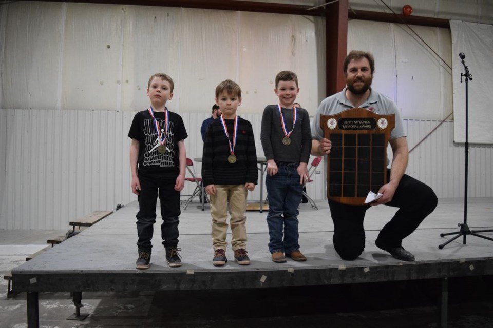 The U7 Canora Cobras are all about introducing young players to hockey and developing a love for the game. Award winners, from left, were: Lowell Rice (most dedicated), Kais Friesen (sportsmanship), Winston Warren (most improved), and no, that big guy on the far right is not a U7 player. That’s co-coach Kelly McTavish accepting the Jerry Mydonick Award for Easton McGregor, who was unable to attend. 