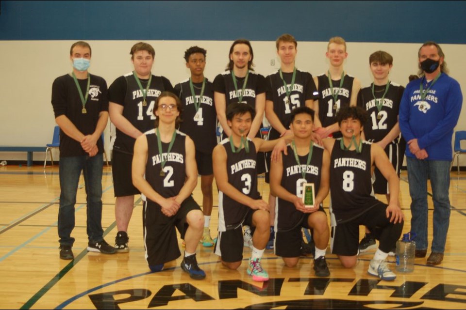 The Preecevllle School senior boys basketball team won the regional playoffs for 2A basketball and earned the privilege to play in the provincial play .