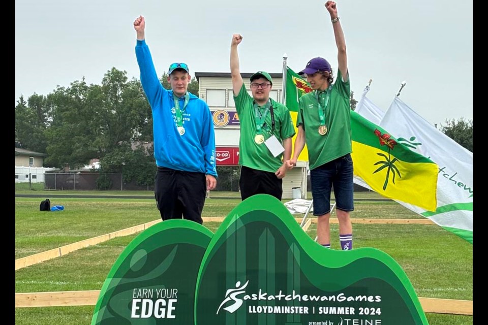 Tanner Svenson on the podium after winning gold in the Special Olympics Summer Games in Lloyminister in 2024.