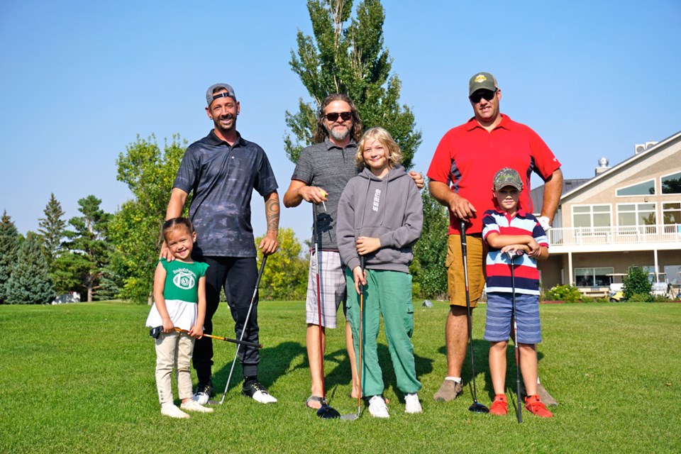 Jeff and Kimberly Schlamp, Jamie and Mikayla Dyer, and Matt and Kip Halkyard competed in the parent-child tournament. 