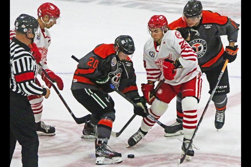 Weyburn Red Wings Shayde Peterson mixed it up at the face-off with Yorkton Terriers players, during the teams' preseason exhibition game on Friday at Crescent Point Place. The Wings were handed a 3-0 loss, their first of the preseason.