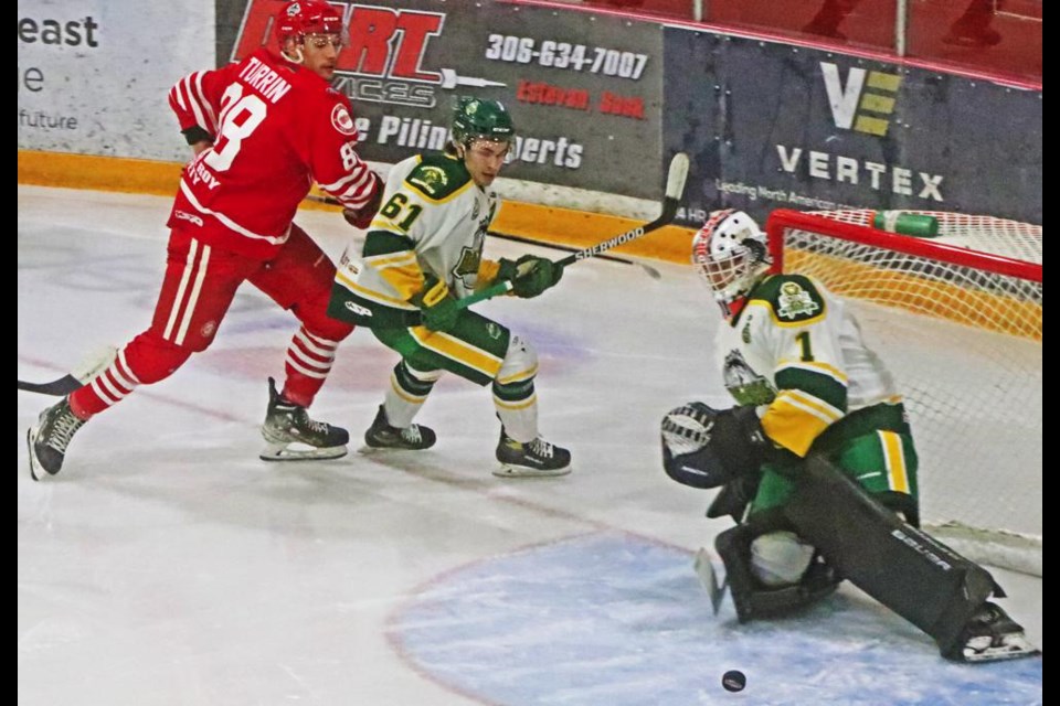 Red Wings player Matteo Turrin watched as his shot was turned aside by the Humboldt goalie early on in the game on Saturday night.