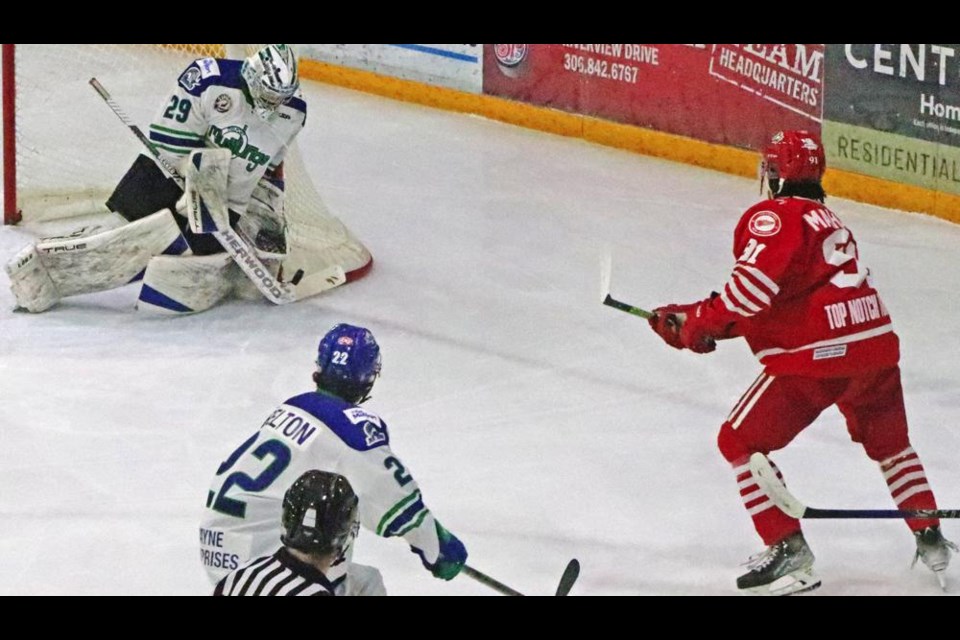 Red Wings player Jerome Maharaj fired on the Melfort goalie in the hopes of a rebound, during this play in the first period on Friday.