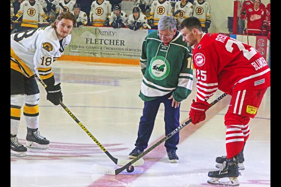 Tom Huston's son, Roger, did the ceremonial puck drop on Saturday evening, in the Tom Huston Classic between the Estevan Bruins and Weyburn Red Wings.