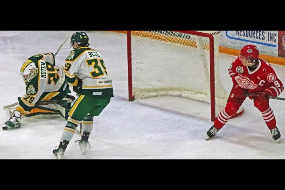 Weyburn player Blake Betson tried to get the puck in to the Broncos net.