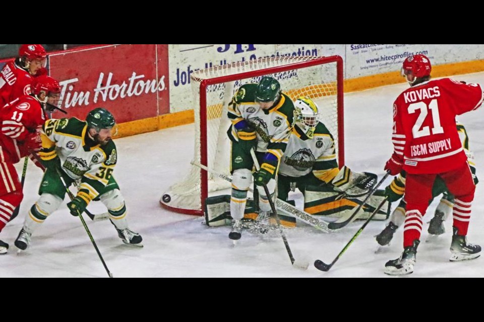 Weyburn's Nick Kovacs watched out front as the puck hit the side of the net on this play.