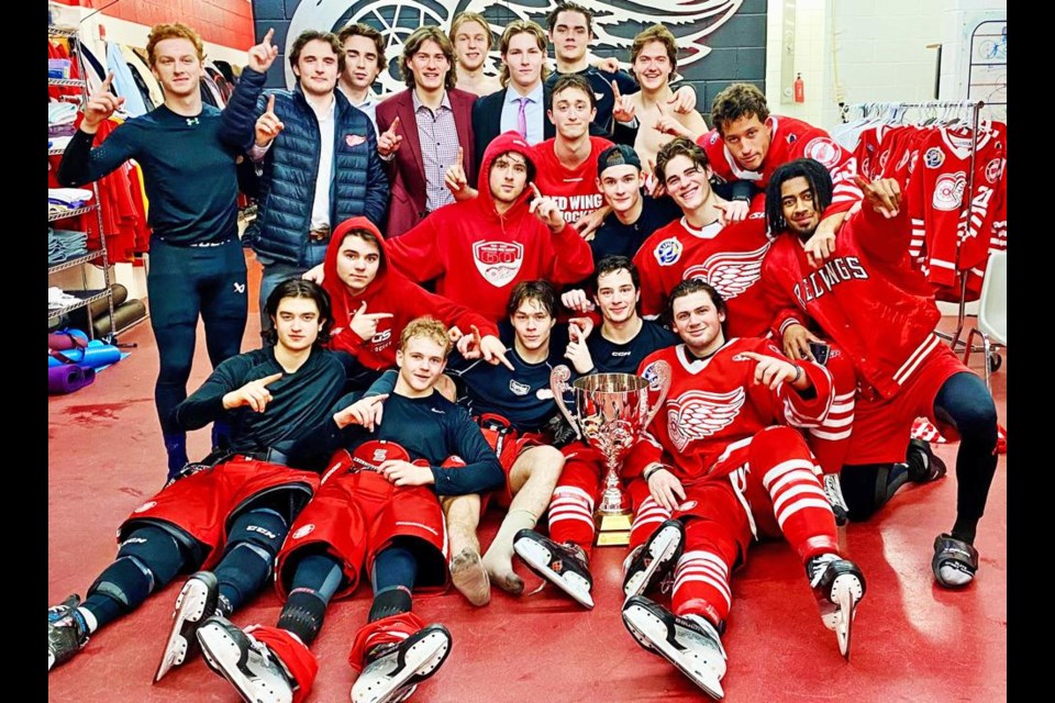 The Weyburn Red Wings celebrate claiming the Highway 39 Cup over Estevan on Friday night, with a 3-2 win at home to take the series.