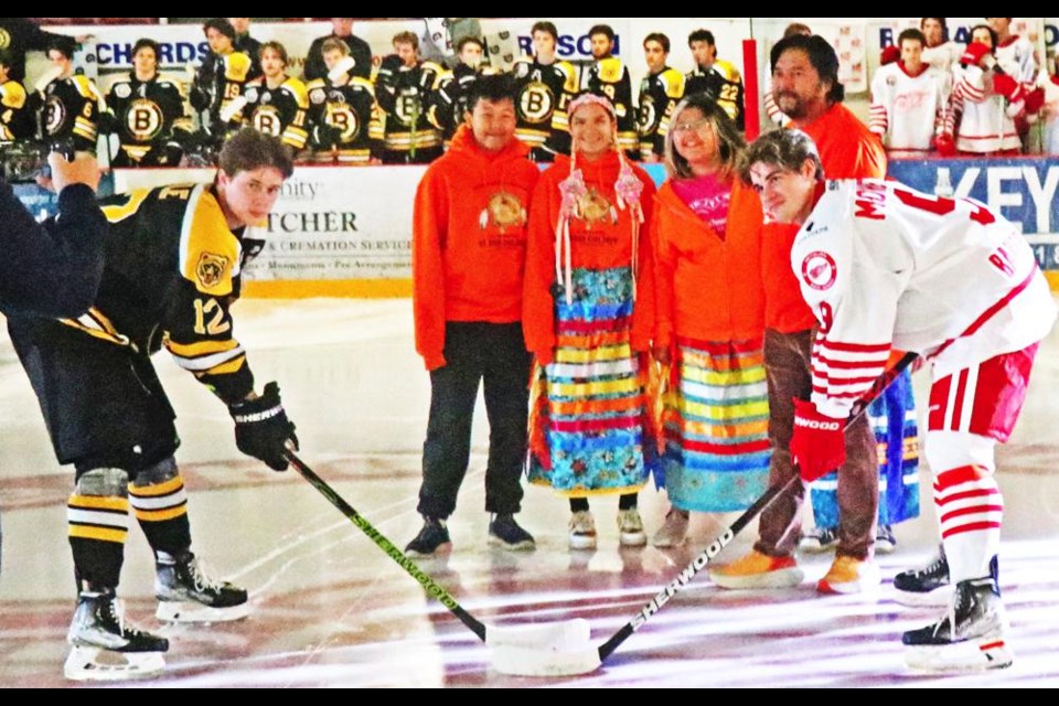The puck drop on Saturday recognized Truth and Reconciliation Day, with White Bear Chief Jonathan Pasap and his family doing the honours, including his mother, Doreen Pasap, who is a residential school survivor, niece Karrah Pasap, and children Colt and CJ Pasap.