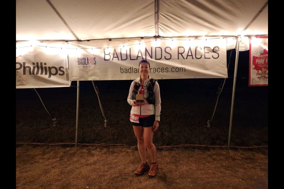 Roanna Sehn with her 50-mile medal at the Maah Daah Hey Trail Race.