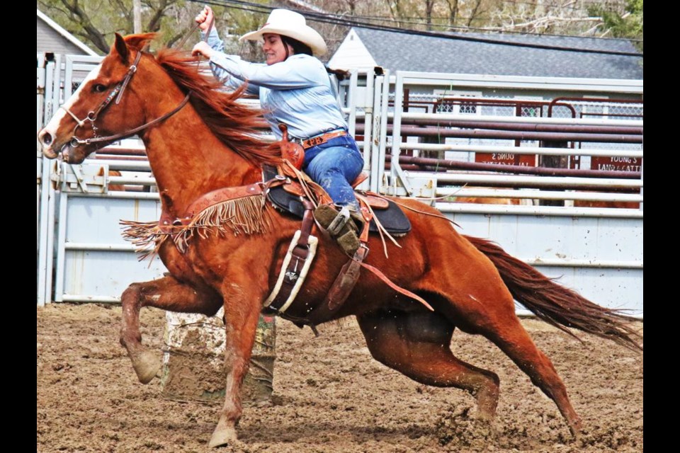 Piper Bigney rode hard in the senior girls barrel racing, at the Weyburn High School Rodeo on Saturday.