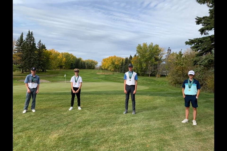 Estevan's Ryan Chernoff, third from right, was part of the team that won gold at the Saskatchewan high school golf provincials in the male division. Chernoff also won the individual gold medal. 