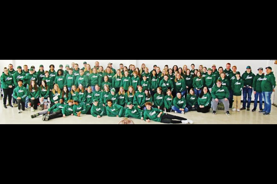 Team Southeast athletes, coaches and managers all gathered for a large group photo, at the end of the pep rally held on Sunday afternoon at Weyburn's McKenna Hall, all wearing their new walk-out uniforms for the Sask Winter Games.