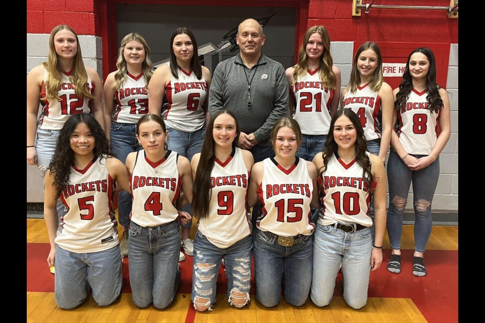 Senior players for the Rockets girls’ basketball team gather at the end of the season. In the back row, from left, are Jessica Beaubien, Jayla Huys, Khanesia Warken, Coach-Al Wandler, Isla Vandierendonck, Sophie Simonsen, and Miyah Tucker. In the front row, from left, are Kian Tolentino, Elizabeth Ratzlaff, Kayley Beaubien, Samantha Engstrom, and Michaela Bumbac.