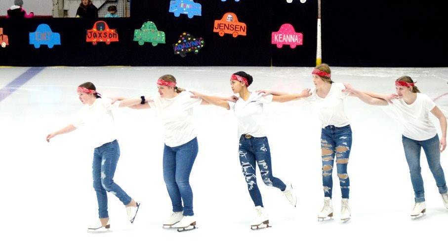 Graduating skaters Raicky Baes, centre, and Devyn McLean, far right, perform with the other senior skaters to “Born to Be Wild.” The other skaters pictured are, left to right, Avery Paradis, Emily Smith and Kade McClellan.